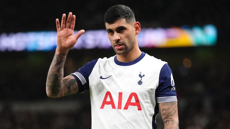 Tottenham Hotspur's Cristian Romero leaves the pitch after picking up an injury