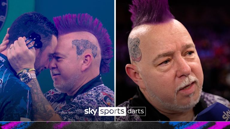 Relive Peter Wright&#39;s winning dart as he beat defending champion Luke Humphries to advance to the World Darts Championship quarter-finals.