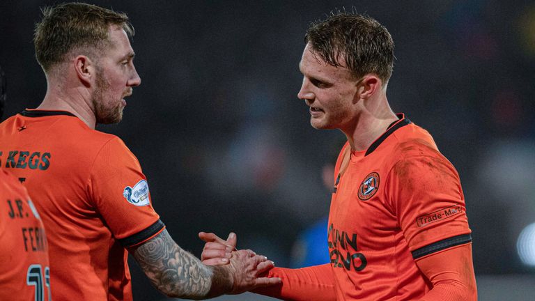 Dundee United's Kevin Holt (left) and Sam Dalby