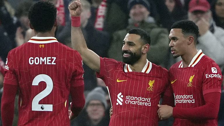 Liverpool's Mohamed Salah celebrates scoring their side's third goal of the game against Leicester