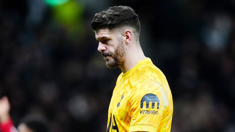 Tottenham Hotspur goalkeeper Fraser Forster stands dejected after Manchester United's Amad Diallo scores their side's second goal of the game during the Carabao Cup quarter-final match at the Tottenham Hotspur Stadium, London. Picture date: Thursday December 19, 2024.