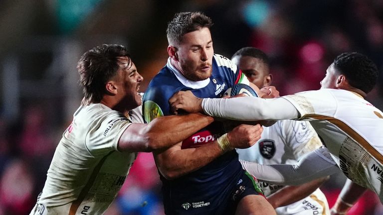 Leicester Tigers star Freddie Steward (centre) is tackled by Sharks pair Bradley Davids and Francois Venter during Saturday's Investec Champions Cup clash