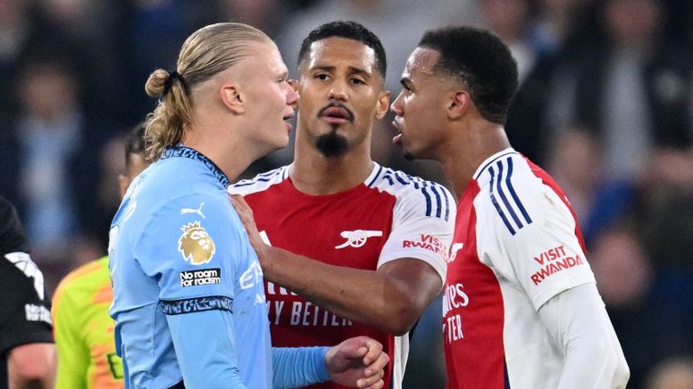 Arsenal's Gabriel and William Saliba clash with Erling Haaland of Manchester City at the Etihad Stadium in September