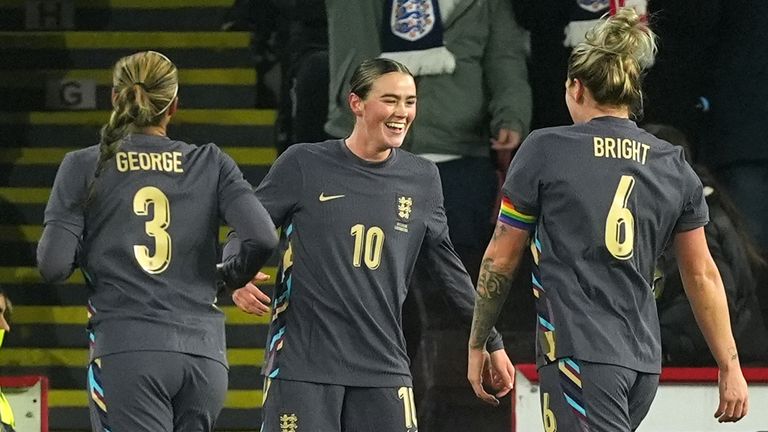 England's Grace Clinton (centre) celebrates scoring