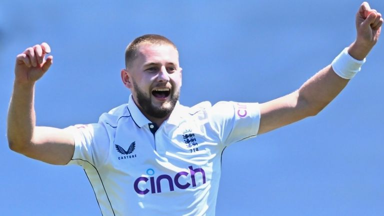 England Gus Atkinson bowler celebrates after taking a hat trick during play on day two of the second cricket test between New Zealand and England at the Basin  Reserve in Wellington, New Zealand, Saturday, Dec.7, 2024. (Kerry Marshall/Photosport via AP)