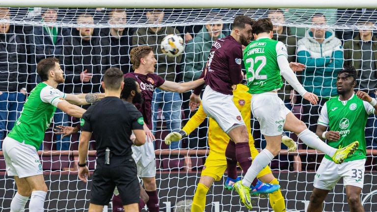 EDINBURGH, SCOTLAND - DECEMBER 26: Hearts' Kye Rowles scores an own goal to make it 1-0 to Hibernian during a William Hill Premiership match between Heart of Midlothian and Hibernian at Tynecastle Park, on December 26, 2024, in Edinburgh, Scotland. (Photo by Ross Parker / SNS Group)