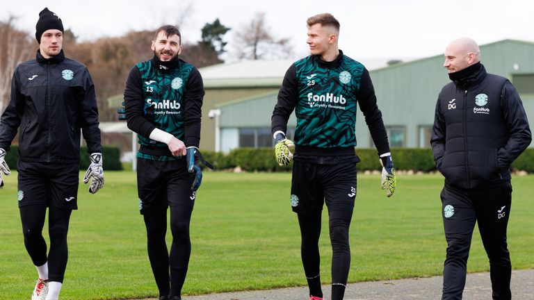 David Gray (R) could look to add a new goalkeeper with Josef Bursik (L) dropped for Jordan Smith (C)