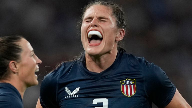 United States' Ilona Maher celebrates after winning their women's quarterfinal Rugby Sevens against Great Britain at the 2024 Olympics (AP Photo/Tsvangirayi Mukwazhi)