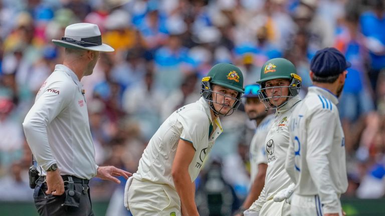 Umpire Michael Gough intervenes after Virat Kohli gets into a heated exchange with debutant Sam Konstas on day one of the Boxing Day Test