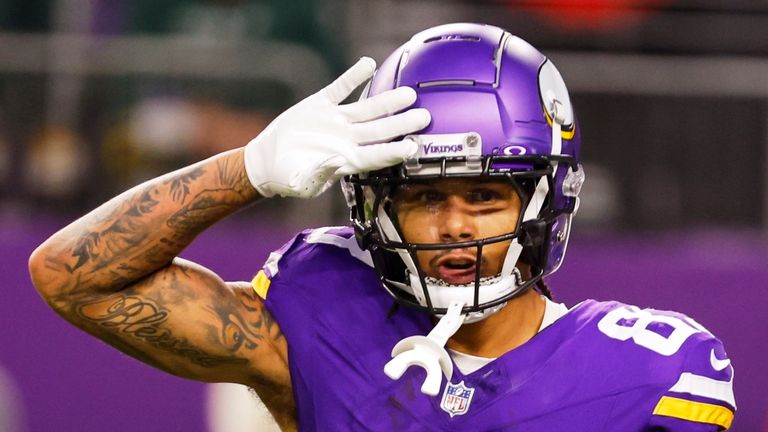 Minnesota Vikings' Jalen Nailor reacts after catching a touchdown pass during the first half of an NFL football game against the Green Bay Packers Sunday, Dec. 29, 2024, in Minneapolis. (AP Photo/Bruce Kluckhohn)