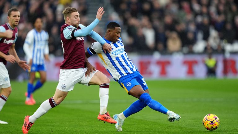 West Ham's Jarrod Bowen (left) and Brighton's Pervis Estupinan battle for the ball 