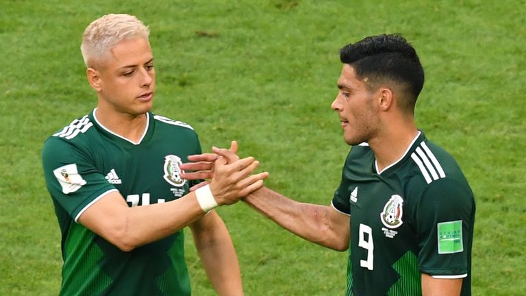 Mexico's forward Javier Hernandez (L) greets Mexico's forward Raul Jimenez after their defeat during the Russia 2018 World Cup round of 16 football match between Brazil and Mexico at the Samara Arena in Samara on July 2, 2018. (Photo by SAEED KHAN / AFP) / RESTRICTED TO EDITORIAL USE - NO MOBILE PUSH ALERTS/DOWNLOADS (Photo credit should read SAEED KHAN/AFP via Getty Images)