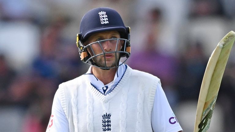 England's Joe Root celebrates scoring 50 runs during play on day two of the second cricket test between New Zealand and England at the Basin Reserve in Wellington, New Zealand, Saturday, Dec.7, 2024. (Kerry Marshall/Photosport via AP)