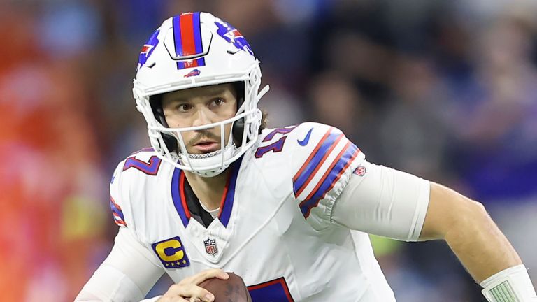 Buffalo Bills quarterback Josh Allen (17) rolls out against the Detroit Lions during the first half of an NFL football game, Sunday, Dec. 15, 2024, in Detroit. (AP Photo/Rey Del Rio)