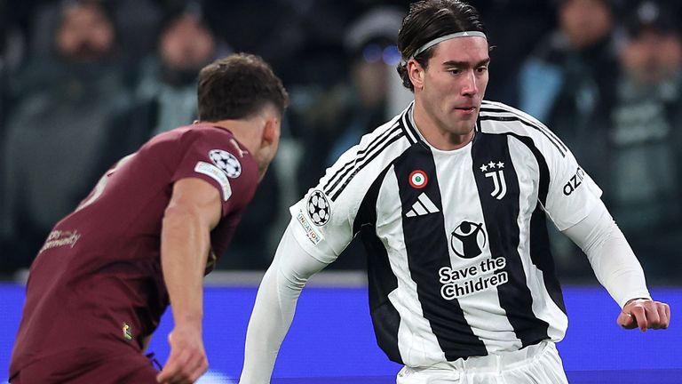 TURIN, ITALY - DECEMBER 11: Dusan Vlahovic of Juventus controls the ball during the UEFA Champions League 2024/25 League Phase MD6 match between Juventus and Manchester City at Juventus Stadium on December 11, 2024 in Turin, Italy. (Photo by Francesco Scaccianoce - UEFA/UEFA via Getty Images)