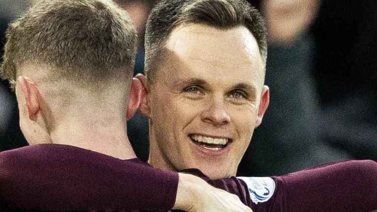 EDINBURGH, SCOTLAND - DECEMBER 07: Hearts Lawrence Shankland celebrates with James Wilson after scoring to make it 1-0 during a William Hill Premiership match between Heart of Midlothian and Dundee at Tynecastle Park, on December 07, 2024, in Edinburgh, Scotland. (Photo by Mark Scates / SNS Group)