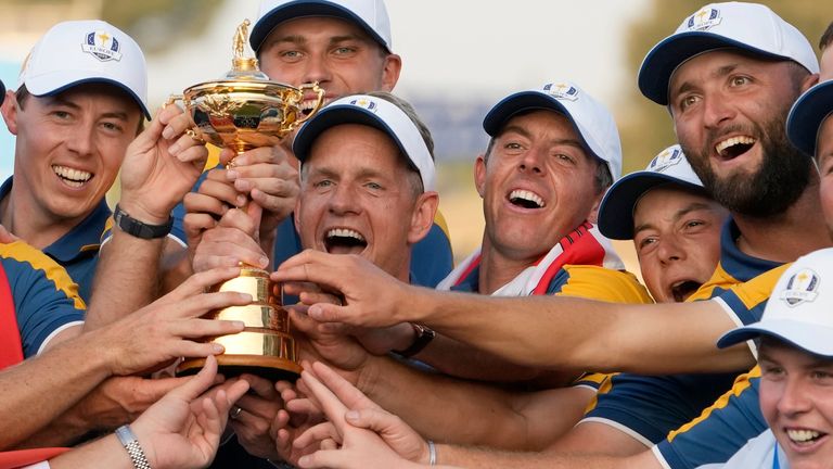 The Europe team led by Europe's Team Captain Luke Donald, center, lift the Ryder Cup after winning it at the Marco Simone Golf Club in Guidonia Montecelio, Italy, Sunday, Oct. 1, 2023. (AP Photo/Alessandra Tarantino) 