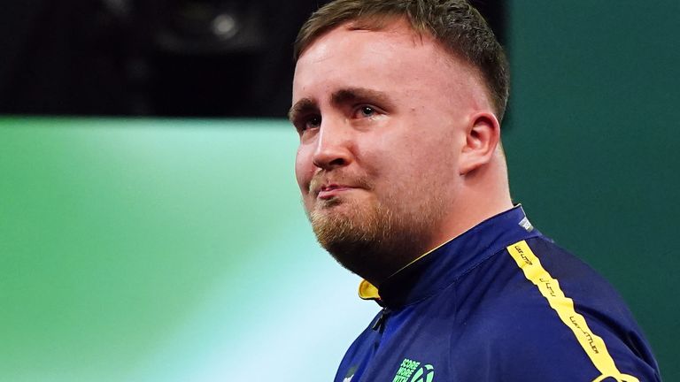 Title favourite Luke Littler showed his emotions after beating Ryan Meikle in the second round of the World Darts Championship