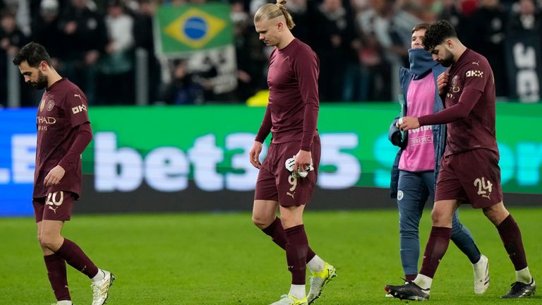 Manchester City's Erling Haaland, center, Bernardo Silva, left, and Josko Gvardiol leave the pitch after their 2-0 defeat by Juventus in the Champions League (AP Photo/Luca Bruno)