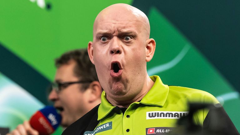 Michael van Gerwen celebrates during his opening match of the World Darts Championship against James Hurrell