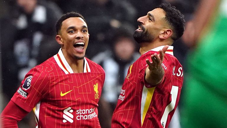 Mohamed Salah celebrates scoring Liverpool's third goal of the game 