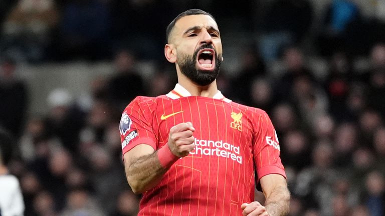 Liverpool's Mohamed Salah celebrates scoring their fourth goal of the game