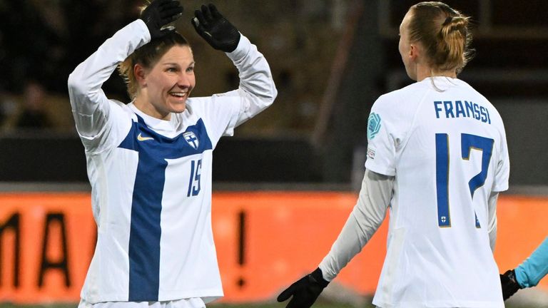 Finland's Natalia Kuikka (left) celebrates after scoring the opening goal against Scotland with team-mate Sanni Franssi (Jussi Nukari/Lehtikuva via AP)