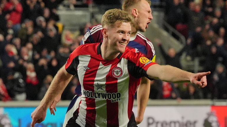 Nathan Collins celebrates scoring Brentford's third