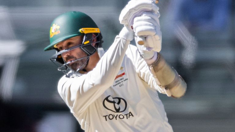 MELBOURNE, AUSTRALIA - DECEMBER 29: Nathan Lyon of Australia drives during day four of the NRMA Insurance Boxing Day Test match of Border Gavaskar trophy between Australia and India at the Melbourne Cricket Ground on December 29, 2024 in Melbourne, Australia. (Photo by Santanu Banik/Speed Media/Icon Sportswire) (Icon Sportswire via AP Images)