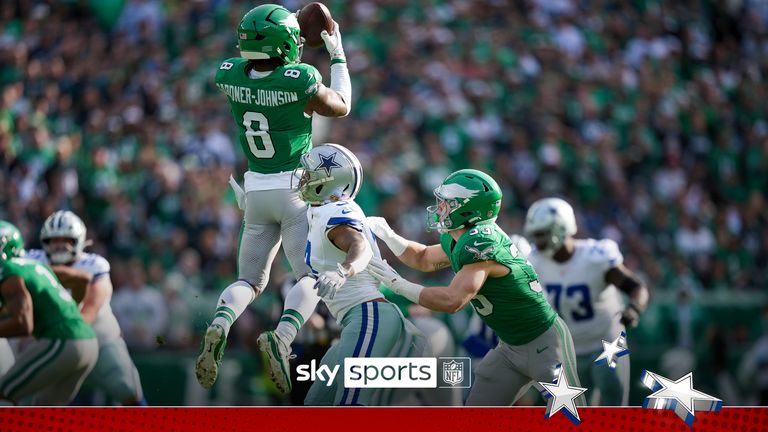 Philadelphia Eagles safety C.J. Gardner-Johnson (8) intercepts a pass intended for Dallas Cowboys wide receiver Brandin Cooks, center, before returning it for a touchdown during the first half of an NFL football game, Sunday, Dec. 29, 2024, in Philadelphia. Eagles' Cooper DeJean (33) helps defend on the play.