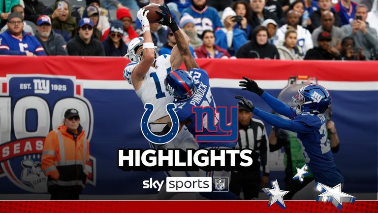 Indianapolis Colts wide receiver Alec Pierce (14) catches a touchdown pass as he is defended by New York Giants safety Jason Pinnock (27) in the second half of an NFL football game Sunday, Dec. 29, 2024, in East Rutherford, N.J.