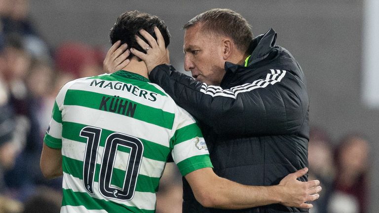 EDINBURGH, SCOTLAND - NOVEMBER 23: Celtic Manager Brendan Rodgers and Nicolas Kuhn during a William Hill Premiership match between Heart of Midlothian and Celtic at Tynecastle Park on November 23, 2024, in Edinburgh, Scotland. (Photo by Ross Parker / SNS Group)