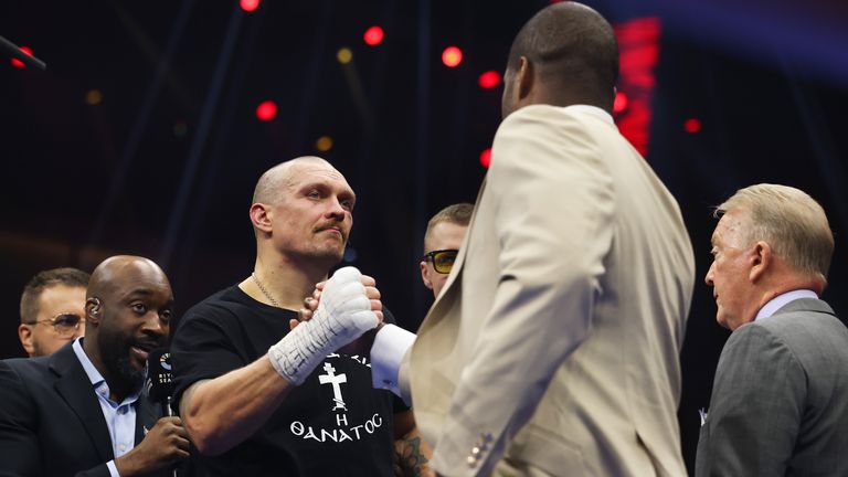 Oleksandr Usyk and Daniel Dubois shake hands in the ring on Saturday night