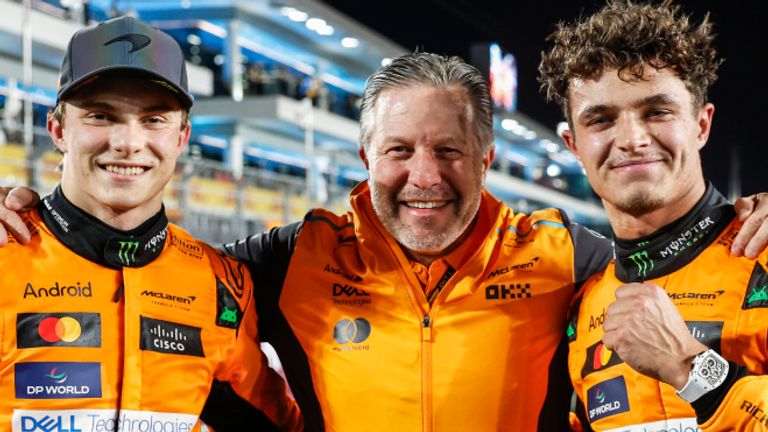 LOSAIL INTERNATIONAL CIRCUIT, QATAR - NOVEMBER 30: Oscar Piastri, McLaren F1 Team, 1st position, Zak Brown, CEO, McLaren Racing, and Lando Norris, McLaren F1 Team, 2nd position, celebrate after the Sprint race during the Qatar GP at Losail International Circuit on Saturday November 30, 2024 in Losail, Qatar. (Photo by Steven Tee / LAT Images)