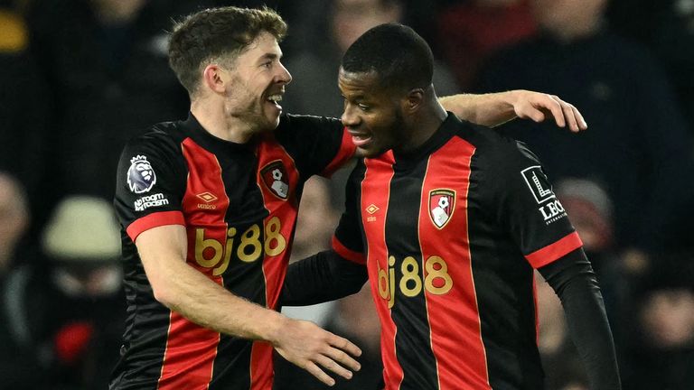 Dango Ouattara is congratulated after scoring a late equaliser for Bournemouth at Fulham