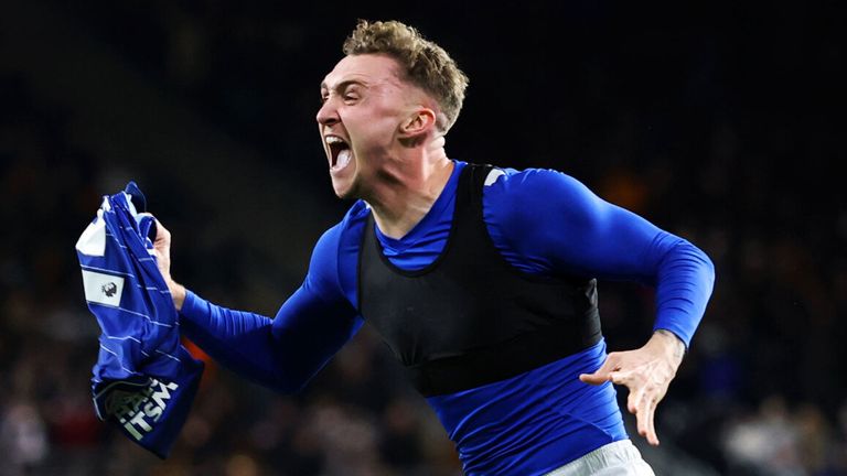 Jack Taylor celebrates after scoring a late winner for Ipswich at Molineux