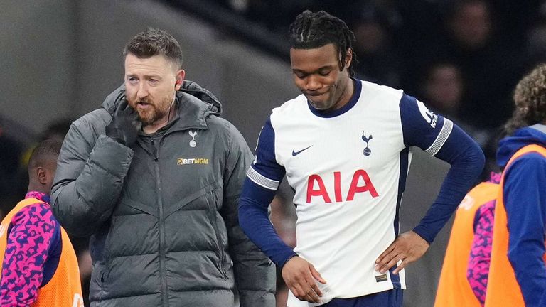 Destiny Udogie leaves the field after picking up an injury during Spurs' clash with Wolves