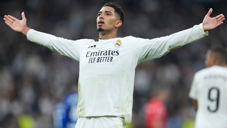 Real Madrid's Jude Bellingham celebrates after scoring the opening goal during the Spanish La Liga soccer match between Real Madrid and Getafe at the Santiago Bernabeu Stadium in Madrid, Spain, Sunday, Dec. 1, 2024. (AP Photo/Bernat Armangue)