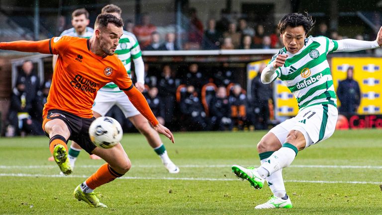 Celtic midfielder Reo Hatate shoots at the Dundee Utd goal