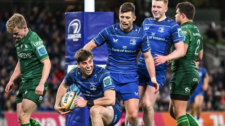 Charlie Tector of Leinster, left, celebrates after scoring his side's second try during the United Rugby Championship match between Leinster and Connacht at the Aviva Stadium in Dublin