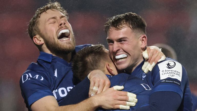 Joe Carpenter of Sale Sharks celebrates scoring a try with team mates during the Investec Champions Cup match between Sale Sharks and Racing 92