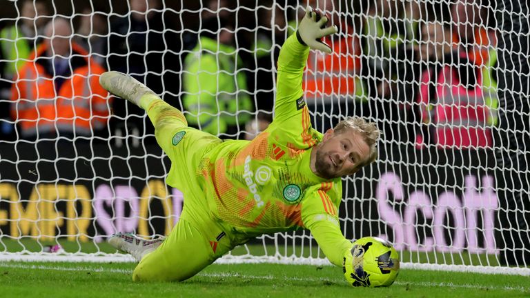 Kasper Schmeichel saves a penalty kick from Ridvan Yilmaz and gives Celtic victory in the Scottish League Cup final