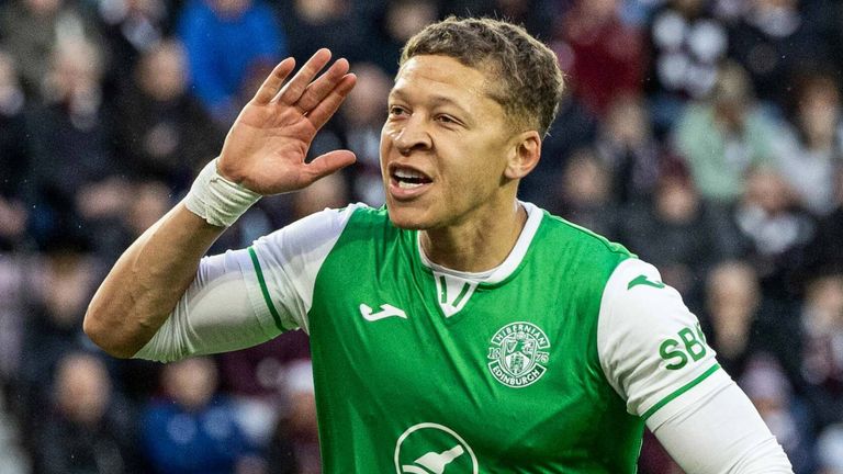 Dwight Gayle celebrates after giving Hibs a 2-1 lead against Hearts