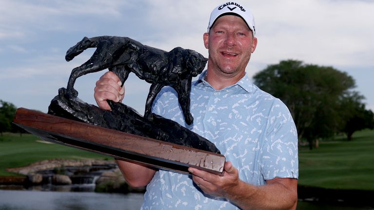 Shaun Norris of South Africa poses with the Alfred Dunhill Championship 2025 trophy