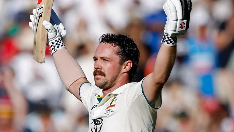 Australia's Travis Head celebrates after scoring a century during the day two of the second cricket test match between Australia and India at the Adelaide Oval in Adelaide, Australia, Saturday, Dec. 7, 2024. (AP Photo/James Elsby)