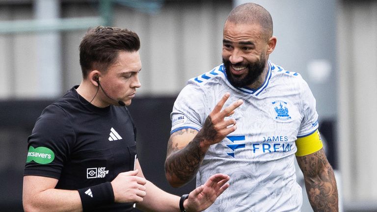 PAISLEY, SCOTLAND - SEPTEMBER 14: Referee Matthew MacDermid and Kilmarnock's Kyle Vassell during a William Hill Premiership match between St Mirren and Kilmarnock at SMiSA Stadium on September 14, 2024, in Paisley, Scotland. (Photo by Alan Harvey / SNS Group)