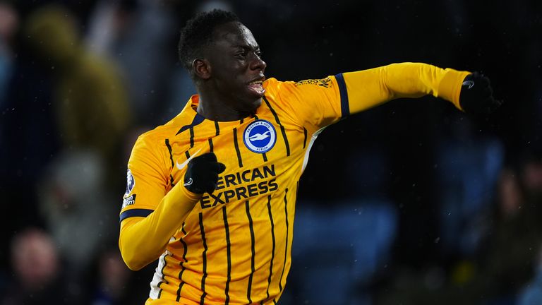 Yankuba Minteh celebrates after doubling Brighton's lead