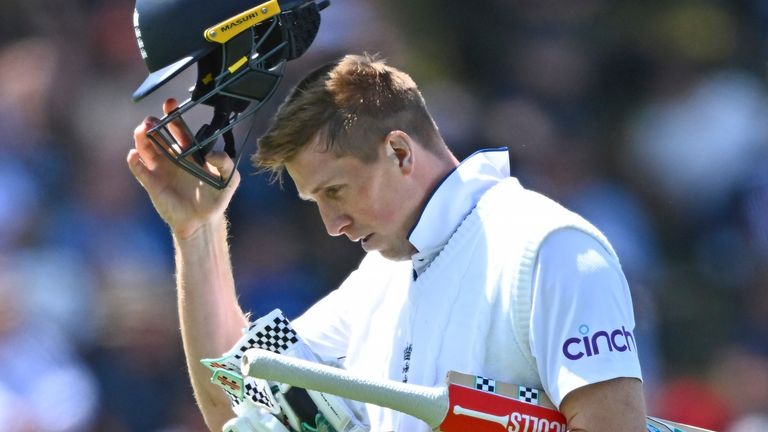 England's Zak Crawley walks from the field after he was out bowled by New Zealand's Matt Henry during play on day one of the second cricket test between New Zealand and England at the Basin Reserve in Wellington, New Zealand, Friday, Dec.6, 2024. (Kerry Marshall/Photosport via AP)