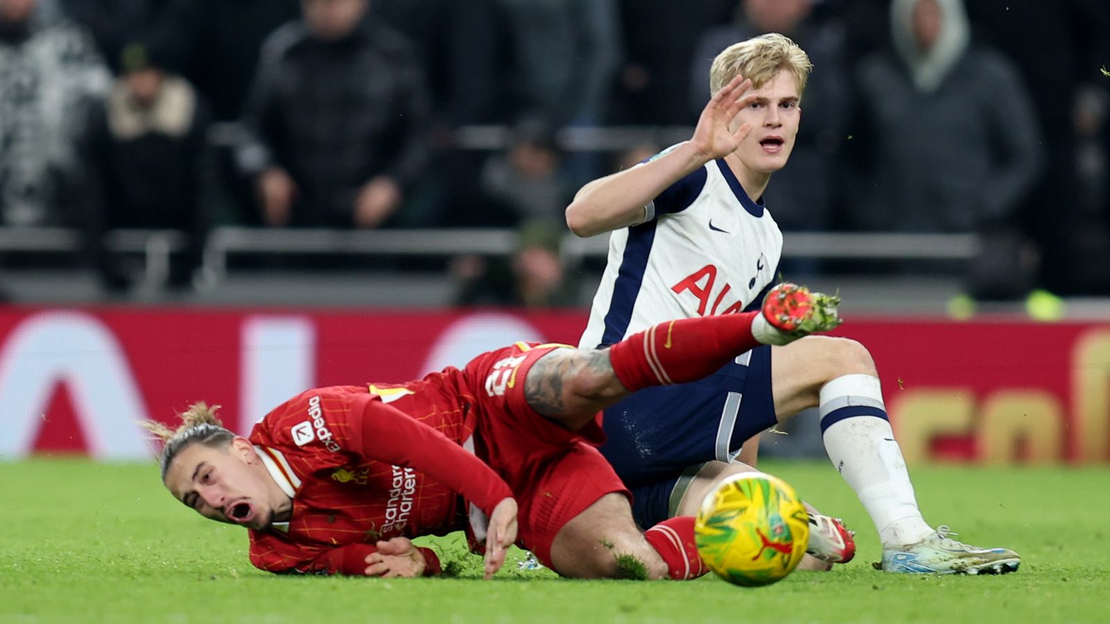 Liverpool’s Arne Slot and Virgil van Dijk frustrated after Tottenham’s Lucas Bergvall escapes red before scoring winner | Football News