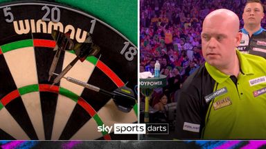 'That's not going to help!' | MVG's third dart scores 0 as it lays on top of another!